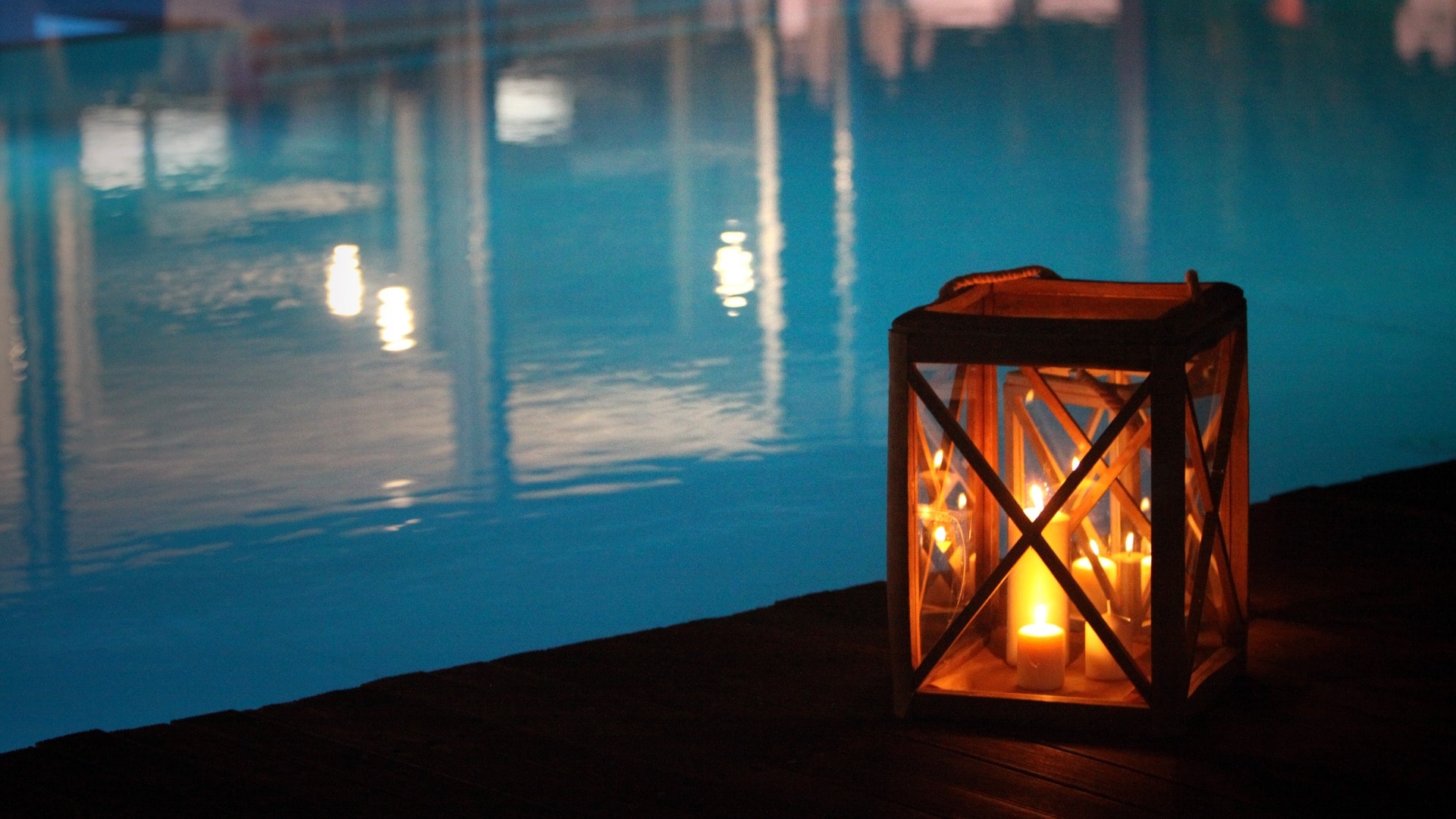 night swimming pool and candles