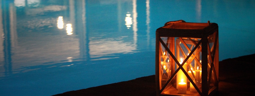 night swimming pool and candles