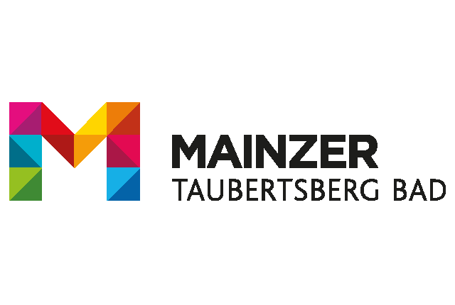 Buntes geometrisches "M"-Logo mit Text "Mainzer Tauberberg Bad".